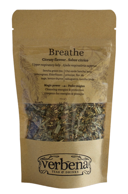 A kraft bag with the tea blend Breathe, showing a transparents label with the name and ingredients of the mix, instructions of preparations. We can also see, the blend in the package and below the logo of Verbena, the company making the tea.